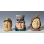 A group of three German / Austrian ceramic novelty tobacco jars in the manner of Bernard Bloch to