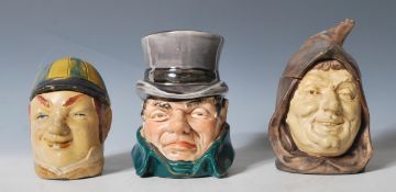 A group of three German / Austrian ceramic novelty tobacco jars in the manner of Bernard Bloch to