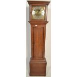 A 19th century  Welsh Georgian country oak brass faced 30 day  longcase clock. The oak case with