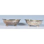 A pair of early 19th Century George III silver hallmarked open table salts having gadrooned rims