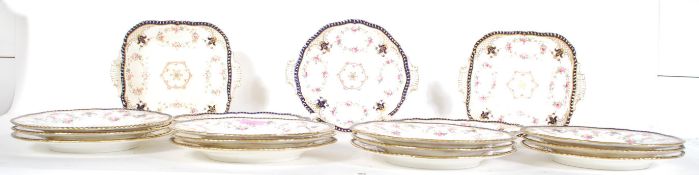 A vintage early 20th Century bone china part dinner service by Coalport, decorated with cobalt