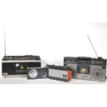 A group of vintage and later portable radios to include a JVC Stereo Radio Cassette Recorder model