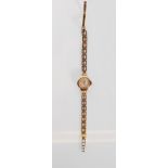 A hallmarked 9ct gold mid 20th Century vintage gradus Incabloc ladies cocktail watch having a