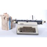 A retro 20th Century Industrial Imperial 90 typewriter together with a box of miscellaneous unused