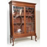 19TH CENTURY MAHOGANY GLAZED BOOKCASE ON STAND.