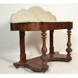 A late 19th Century Victorian mahogany wash stand having reeded knopped turned supports to the