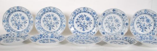 A set of 10 Carl Teichert Meissen onion pattern plates having transfer printed blue and white