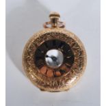 A 20th Century 18ct gold half hunter pocket fob watch having scrolled rococo style decoration to the