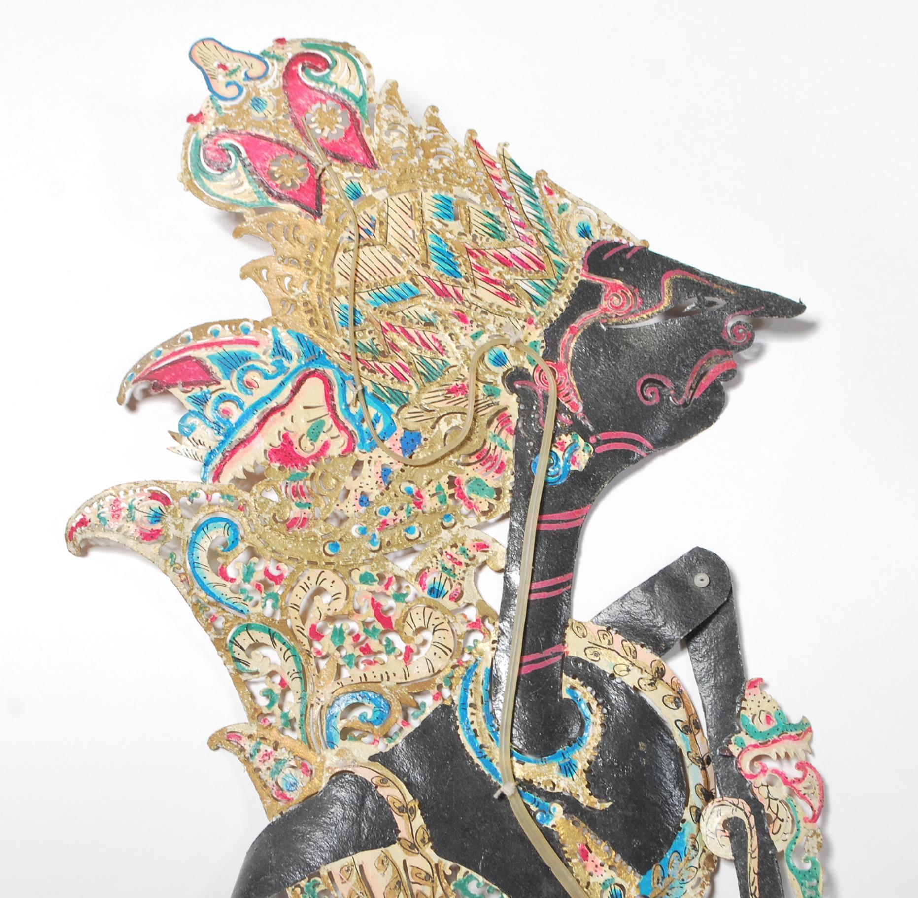 A  pair of believed late 19th Century / early 20th century Indonesian shadow puppets being hand - Image 2 of 10