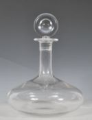 A 20th Century Baccarat crystal red wine decanter having a round stopper atop, waisted neck and