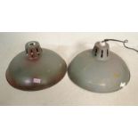 A matching pair of retro 20th Century industrial hanging ceiling lights with the shades of UFO