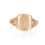 A hallmarked 9ct gold signet ring having a cushion shaped head with engraved initials. Assay