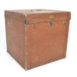 An early 20th Century Belgian steamer travel trunk of unusual square cubic form, the exterior