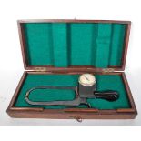 A 20th century vintage M. P. J. Dial Calliper Gauge set within its original wooden case having a