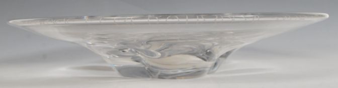 A 20th Century etched  studio art glass dish by Orrefors, the dish presented by the National