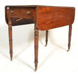 A Victorian 19th century mahogany pembroke table. Raised on turned legs with castors having a single