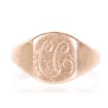A hallmarked 9ct gold signet ring with a faceted panel to the head engraved with the initials CC.