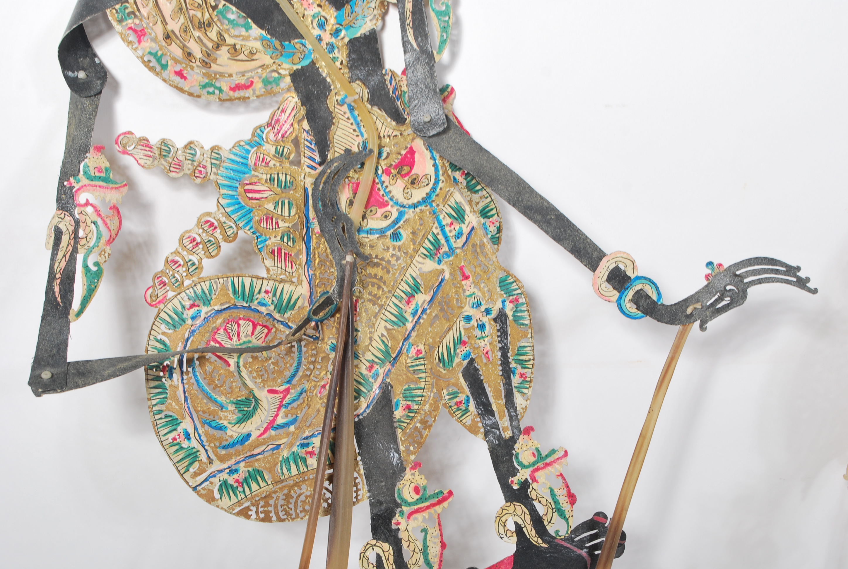 A  pair of believed late 19th Century / early 20th century Indonesian shadow puppets being hand - Image 4 of 10