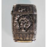 A silver plated vesta case in the form of a barrel having an engraved figure of a lady to the