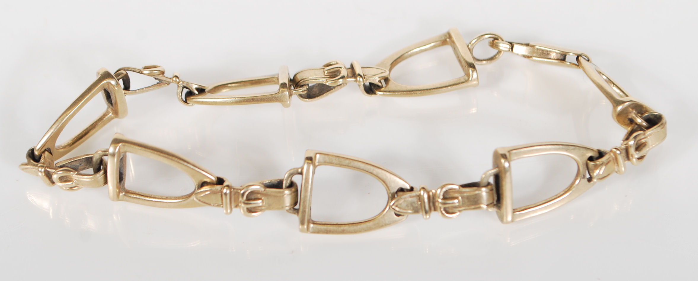 A 9ct Gold hallmarked designer bracelet by Rosemary Hetherington, the bracelet designed as Horse