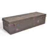 An early 20th Century ebonised metal military trunk / strong box having ' Huntington Whiteley '