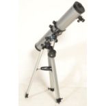 A 20th century scientific Celestron PowerSeeker 114 coated optics telescope marked D=114mm F=900mm
