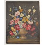 A 20th Century oil on canvas still life painting depicting a floral bouquet of flowers in an urn