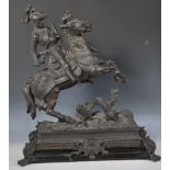 An early 20th Century cast spelter figurine sculpture depicting an armoured figure / knight on
