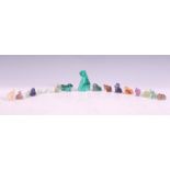 A collection of 20th Century carved precious stone animal figurines to include two malachite