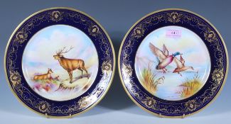 A pair of 20th Century Aynsley cabinet plates from the Fine Art Collection being hand painted by