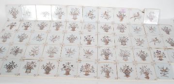 A collection of vintage 20th Century French tiles by Desvres, each being hand painted with brown