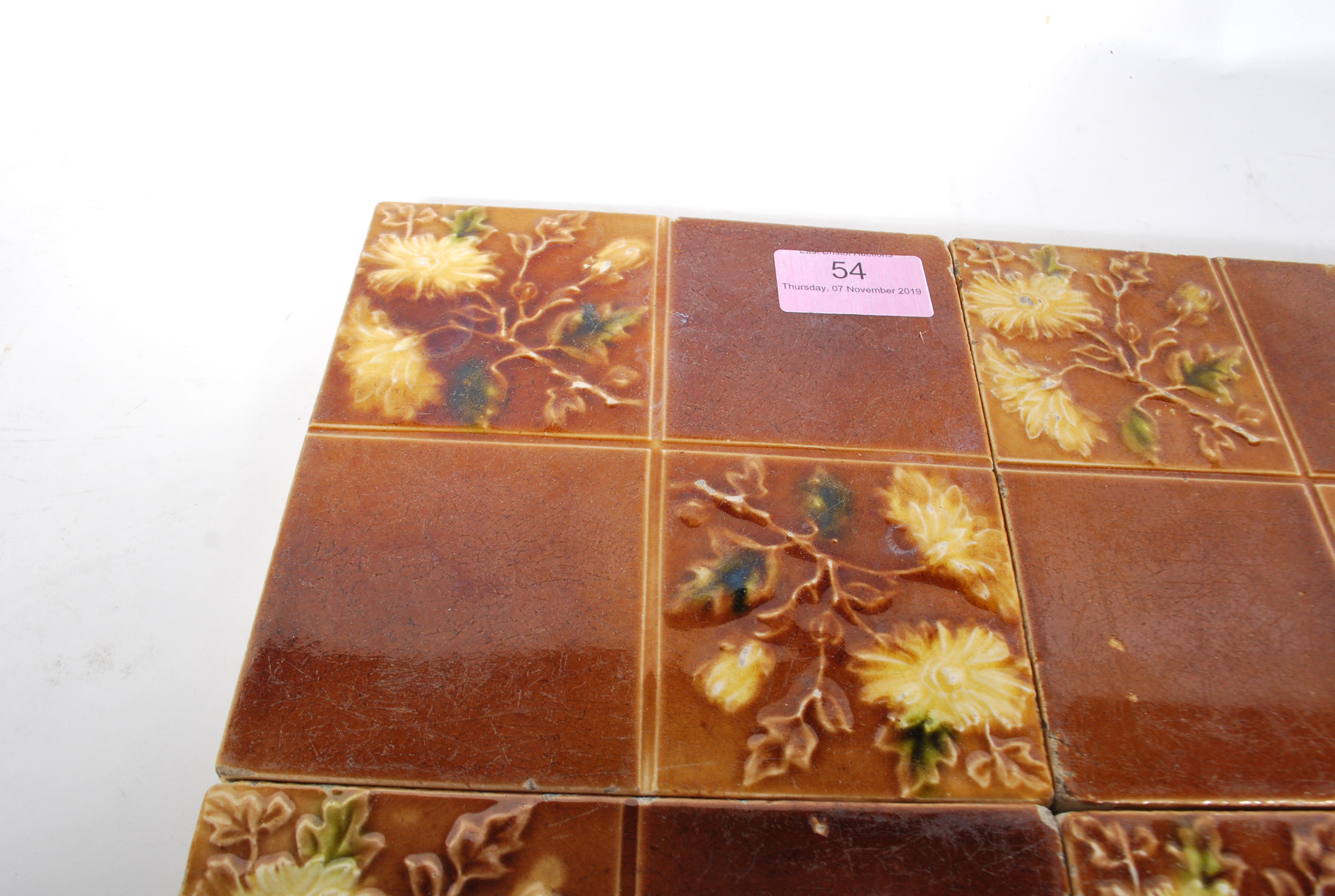 A set of four Victorian Staffordshire majolica tiles each of sectional design having floral - Image 5 of 6