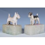 A pair of vintage 20th Century cast figure bookends in the form of dogs. One being an Airedale and