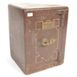 A 19th Century Victorian cast iron painted safe of rectangular having brass locking mechanism and