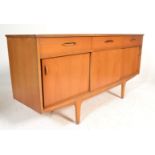 A mid century teak wood credenza sideboard comprising 3 short drawers over cupboards beneath, all