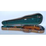 A vintage first half of the 20th Century cased violin and bow, two piece back, f holes to front,