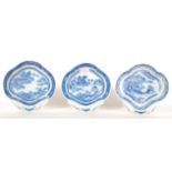 A group of three matching blue and white Chinese scalloped dishes dating to the 20th Century, each