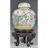 A 19th Century Chinese Qing Dynasty porcelain ginger / temple jar and cover having hand painted