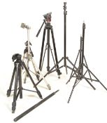 A collection of camera tripods of varying size and makes to include Manfrotto 117B with Bridging