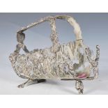 A 20th Century silver plated French style wine holder having repousse grape vine decoration raised