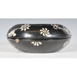 An early 20th Chinese lacquer box of round form having black ground with mother of pearl inlaid