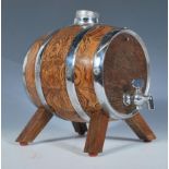 A vintage 20th Century Ryecraft brandy dispenser / decanter in the form of a wooden barrel with