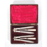 A late 19th Century High Victorian cased four piece Lobster / Crustacean cracker set, comprising