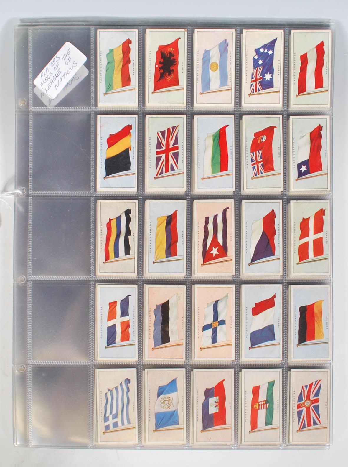 A selection of vintage Player's military related cigarette cards to include eight full sets; flags