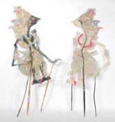 A  pair of believed late 19th Century / early 20th century Indonesian shadow puppets being hand