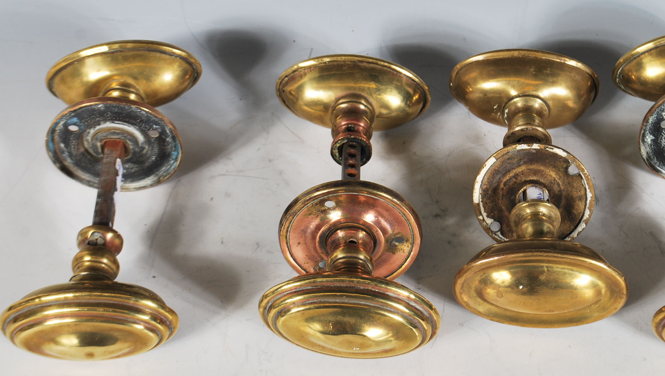 A group of five pairs of 19th Century Victorian brass door handles of oval stepped form. Each pair - Image 3 of 6