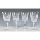 A set of four Waterford crystal cut glass goblet / wine glasses in the 'Lismore' pattern having