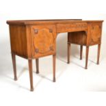 A 19th Century mahogany breakfront sideboard credenza, the rectangular top over a central drawer