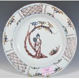 An 18th Century Bristol Delft Temple Back earthenware polychrome plate hand painted with a Chinese