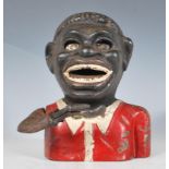 A mid 20th Century cast iron cold painted novelty ' Little Joe ' style money bank having a